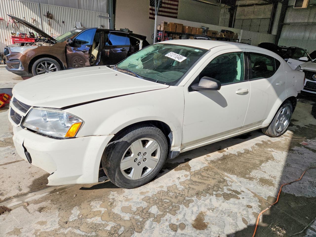 2009 Dodge Avenger SE, VIN 1B3LC46B89N535440 — Зад