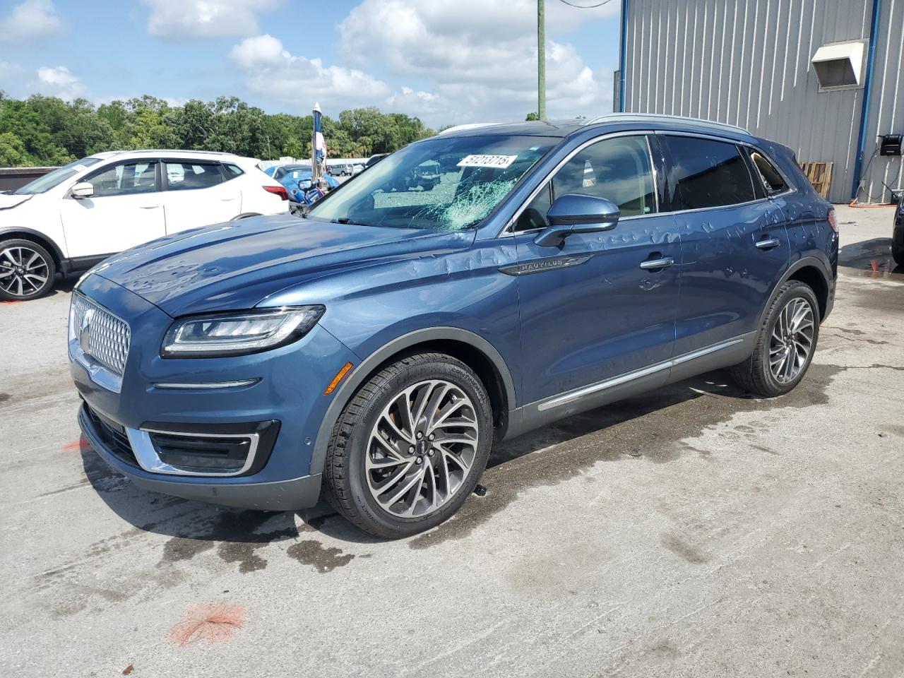 2019 Lincoln Nautilus Reserve, VIN 2LMPJ6LPXKBL51006 — Vandalism