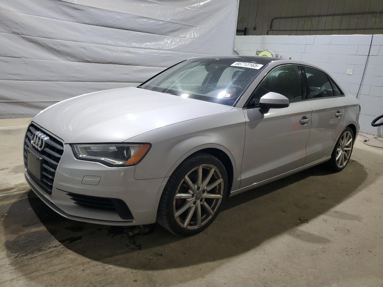 2015 Audi A3 Premium, VIN WAUBFGFF6F1119425 — Side