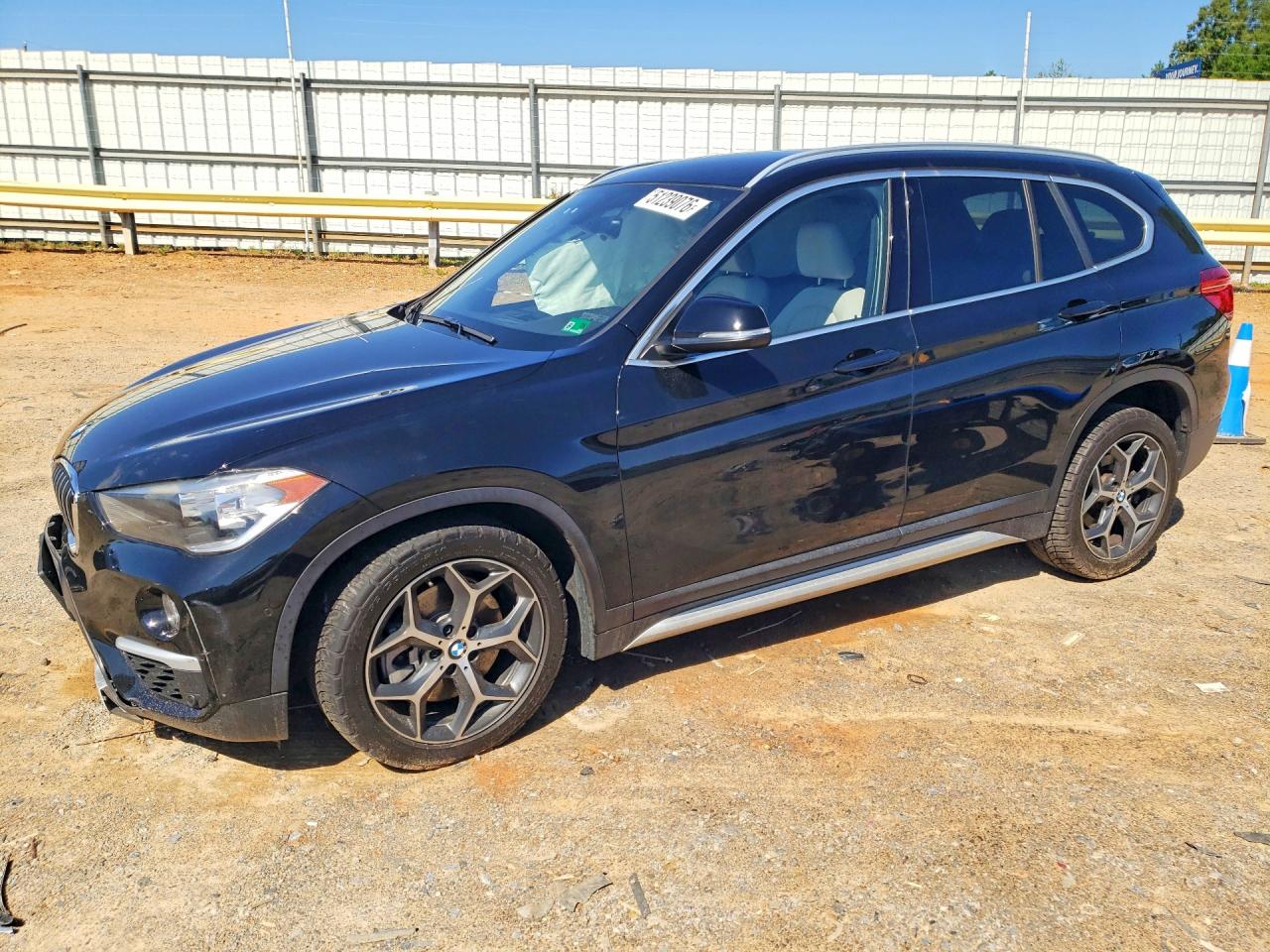 2018 BMW X1 xDrive28i, VIN WBXHT3C38J5L26945 — Front end