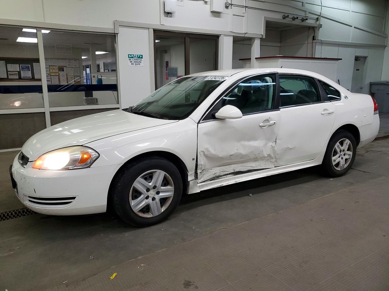 2009 Chevrolet Impala LS, VIN 2G1WB57N991115872 — Side