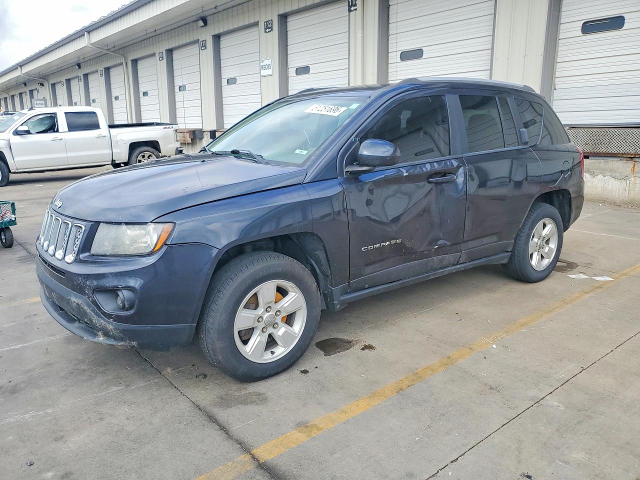 2016 Jeep Compass Latitude, VIN 1C4NJCEA5GD543255 — Side