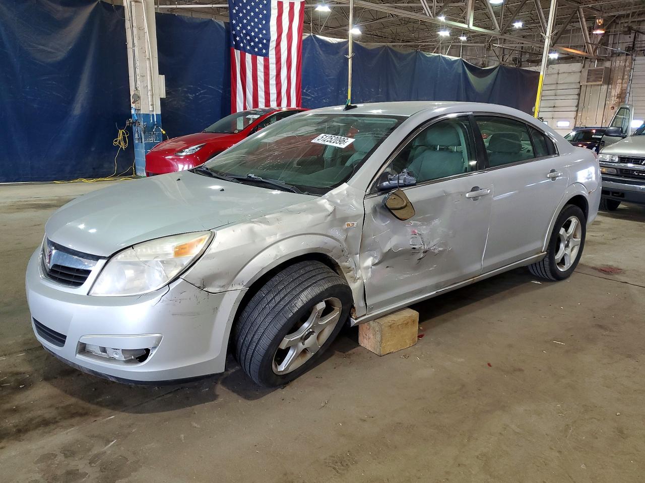 2009 Saturn Aura XE, VIN 1G8ZS57B49F205766 — Бок