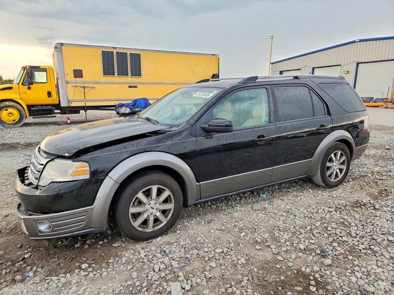 2008 Ford Taurus X SEL, VIN 1FMDK02W08GA22754 — Side