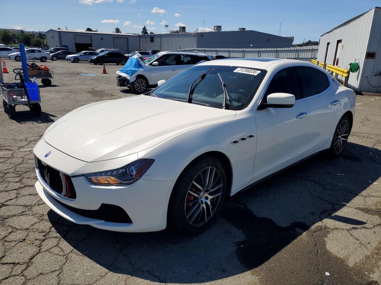 2015 Maserati Ghibli, VIN ZAM57XSA4F1131589 — Normal wear