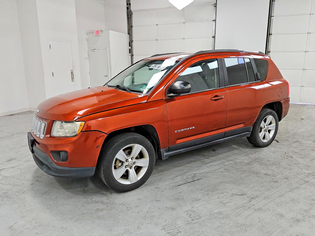 2012 Jeep Compass Sport, VIN 1C4NJCBA8CD605892 — Side
