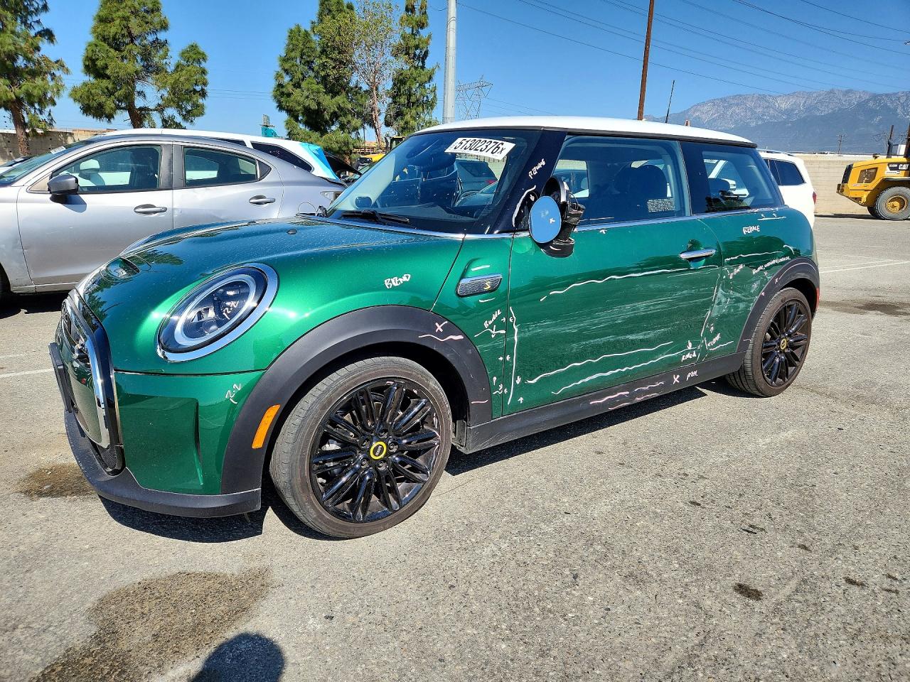 2024 MINI Hardtop Cooper SE, VIN WMW13DJ01R2V87986 — Side