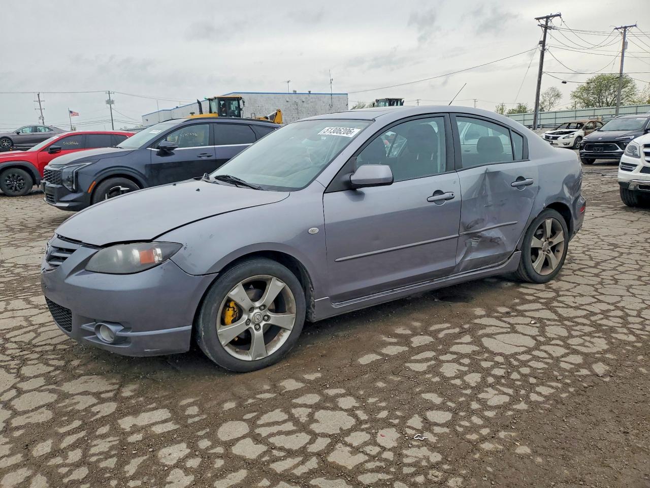 2004 Mazda 3 s, VIN JM1BK323541135311 — Side