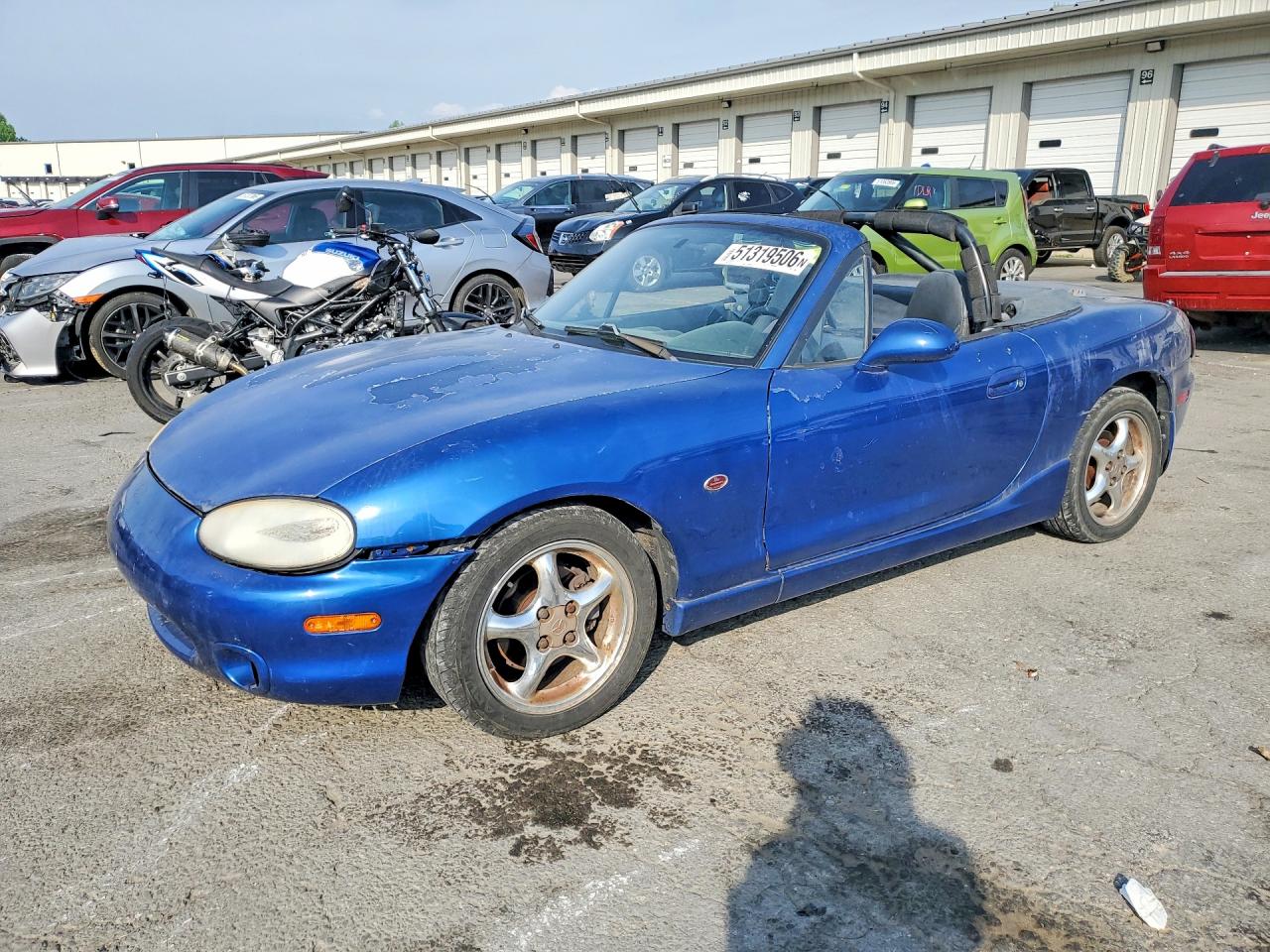 1999 Mazda MX-5 Miata, VIN JM1NB3539X0134309 — Minor dents and scratches