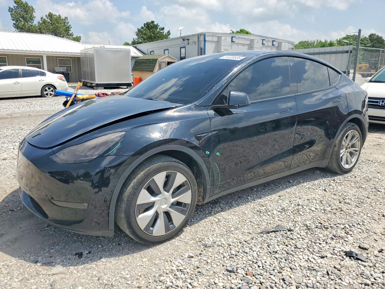 2022 Tesla Model Y Long Range, VIN 7SAYGDEE3NF328499 — Град