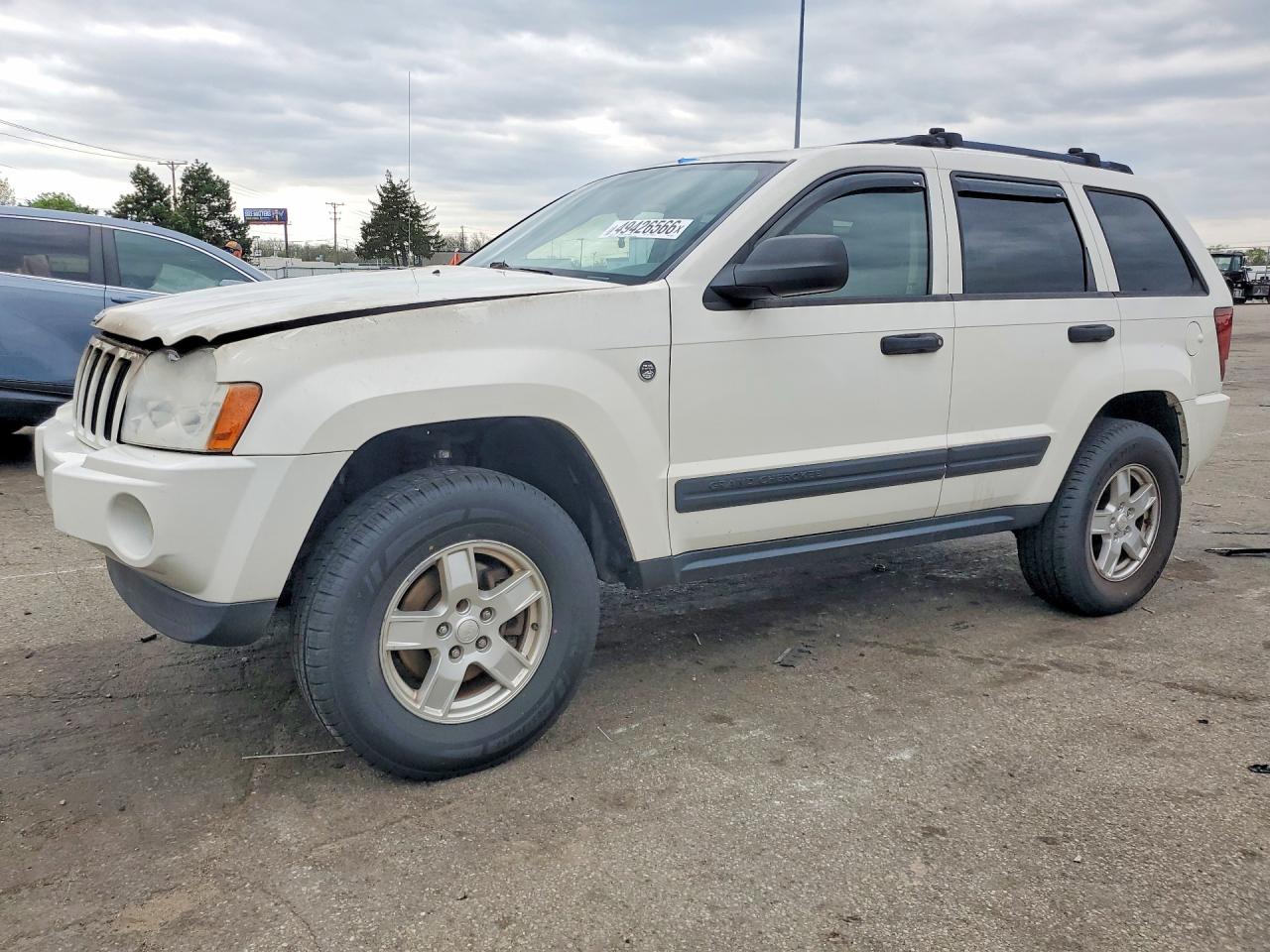 2006 Jeep Grand Cherokee Laredo, VIN 1J4HR48N06C212771 — Engine fire