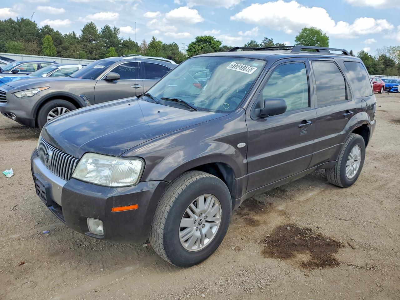 2007 Mercury Mariner Luxury, VIN 4M2CU81177KJ04100 — Minor dents and scratches