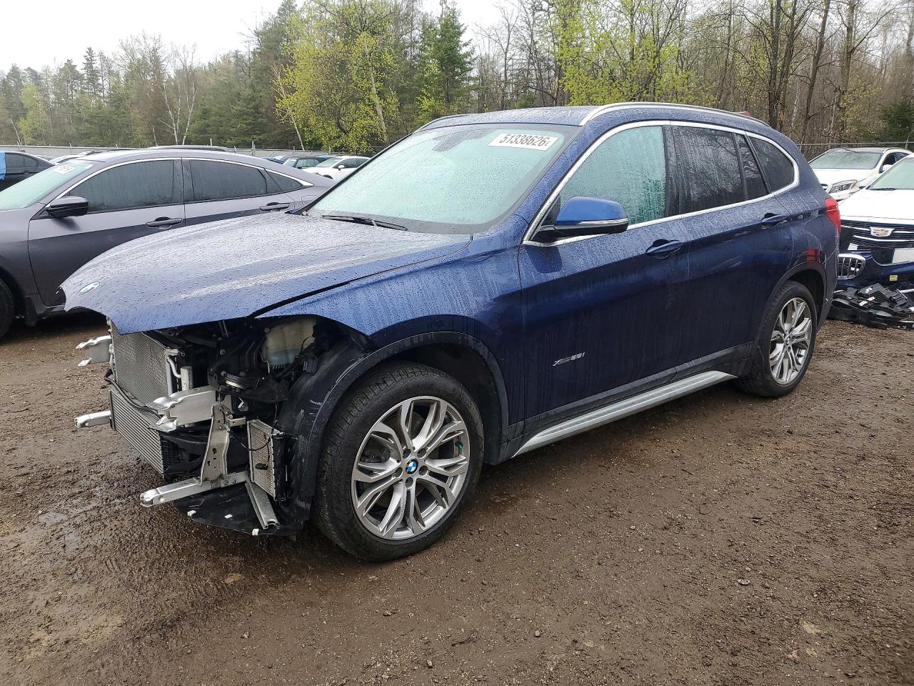 2018 BMW X1 xDrive28i, VIN WBXHT3C31J5K29781 — Front end
