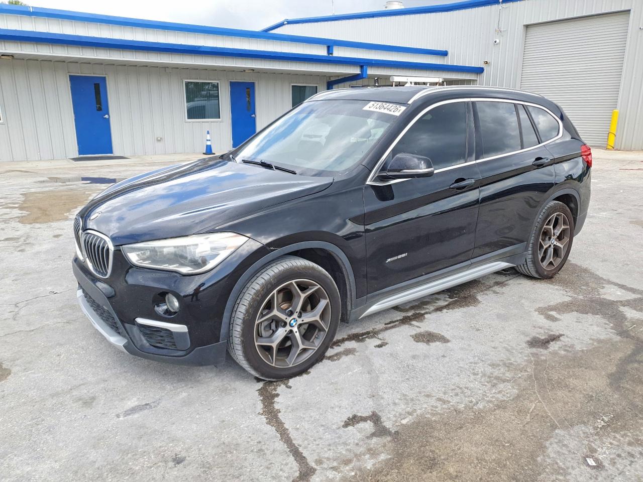 2016 BMW X1 xDrive28i, VIN WBXHT3Z33G4A48786 — Rear end