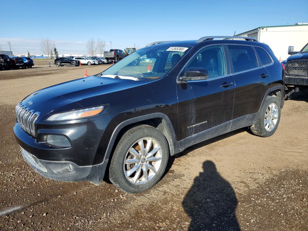 2014 Jeep Cherokee Limited, VIN 1C4PJMDS5EW290738 — Бок