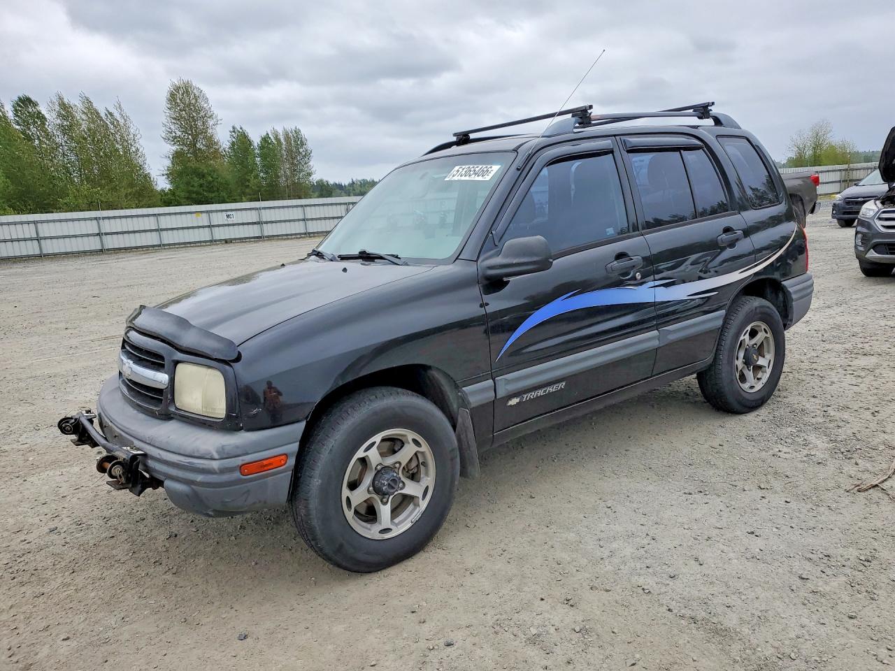 2000 Chevrolet Tracker, VIN 2CNBJ13C9Y6932455 — Side