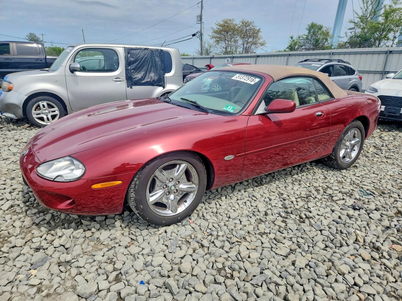 1998 Jaguar XK, VIN SAJGX2240WC026130 — Side