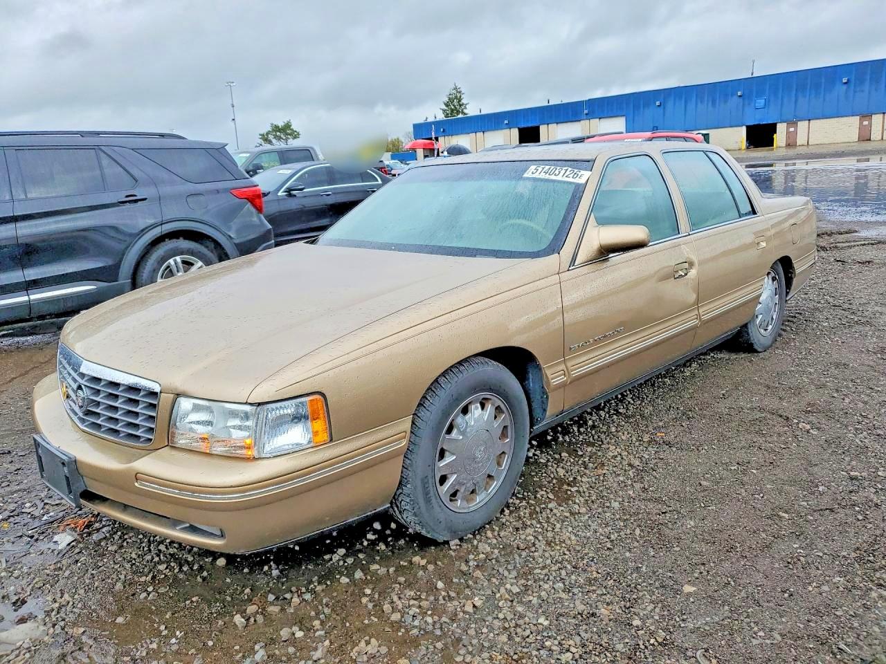 1999 Cadillac Concours, VIN 1G6KF5490XU742854 — Зад