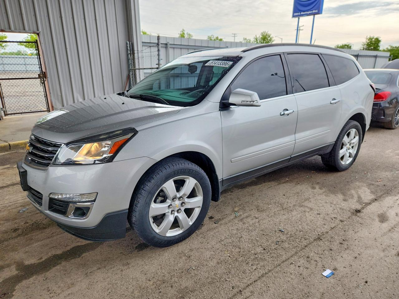 2017 Chevrolet Traverse LT, VIN 1GNKRGKD9HJ327095 — Hail