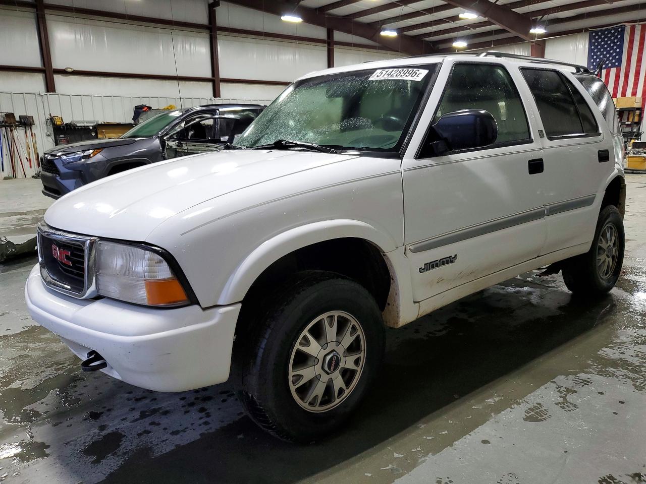2001 GMC Jimmy SLE, VIN 1GKDT13W612128381 — Зад