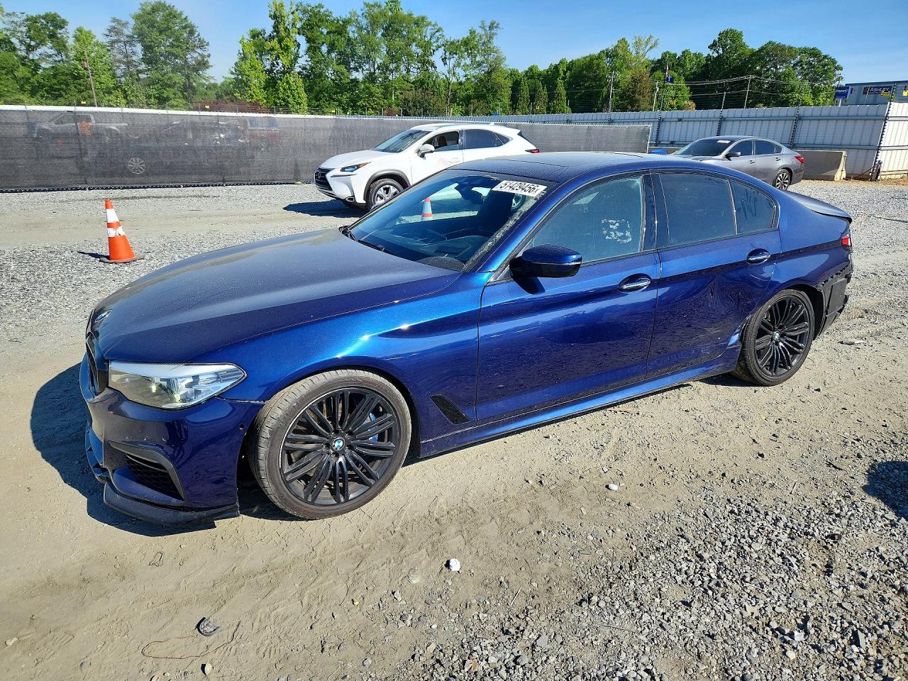 2018 BMW 5 Series 540i xDrive, VIN WBAJE7C59JWD52028 — Rear end