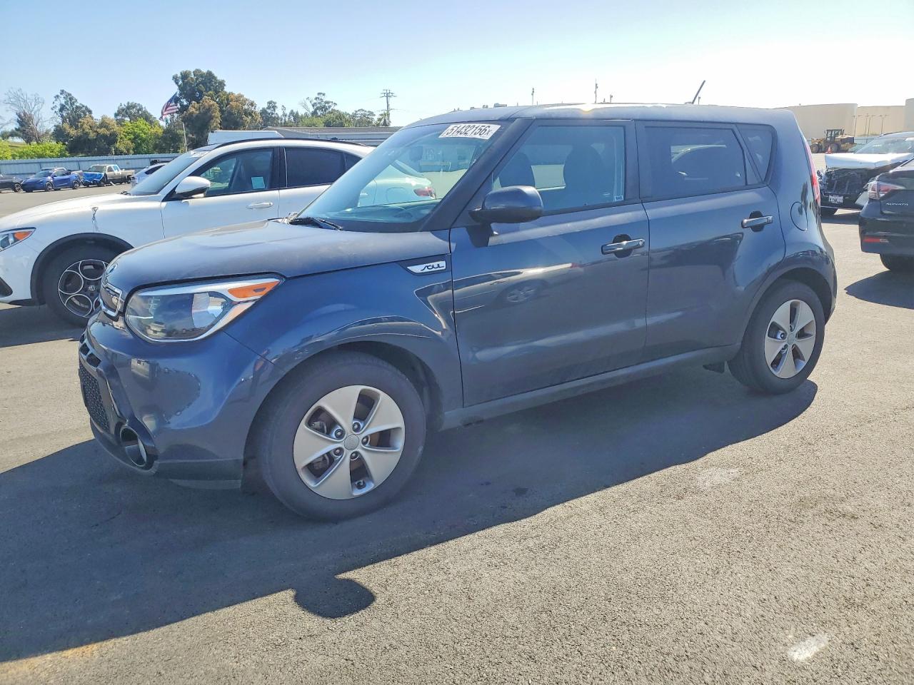 2016 Kia Soul +, VIN KNDJP3A58G7320633 — Side