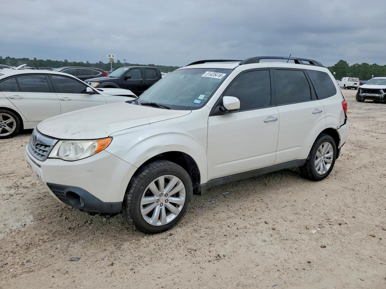 2011 Subaru Forester X Limited, VIN JF2SHBECXBH704728 — Front end