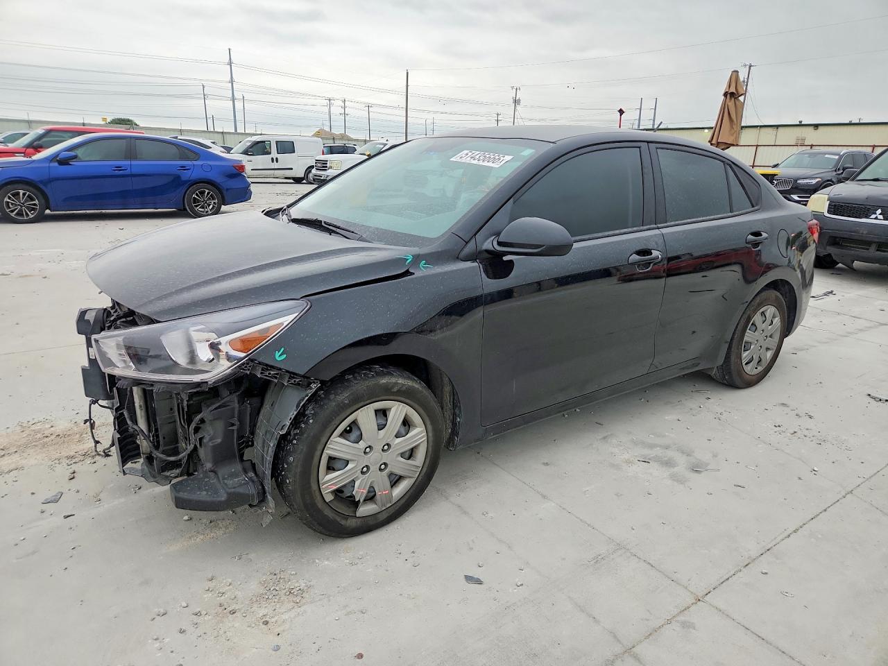 2023 Kia Rio S, VIN 3KPA24AD5PE615670 — Front end