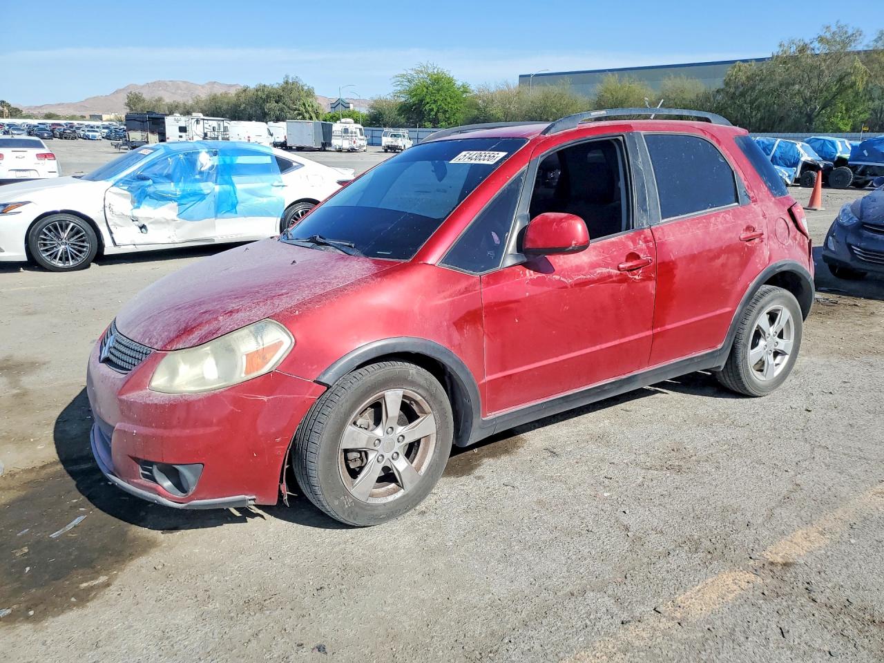 2012 Suzuki SX4 Crossover, VIN JS2YB5A39C6301294 — Rear end