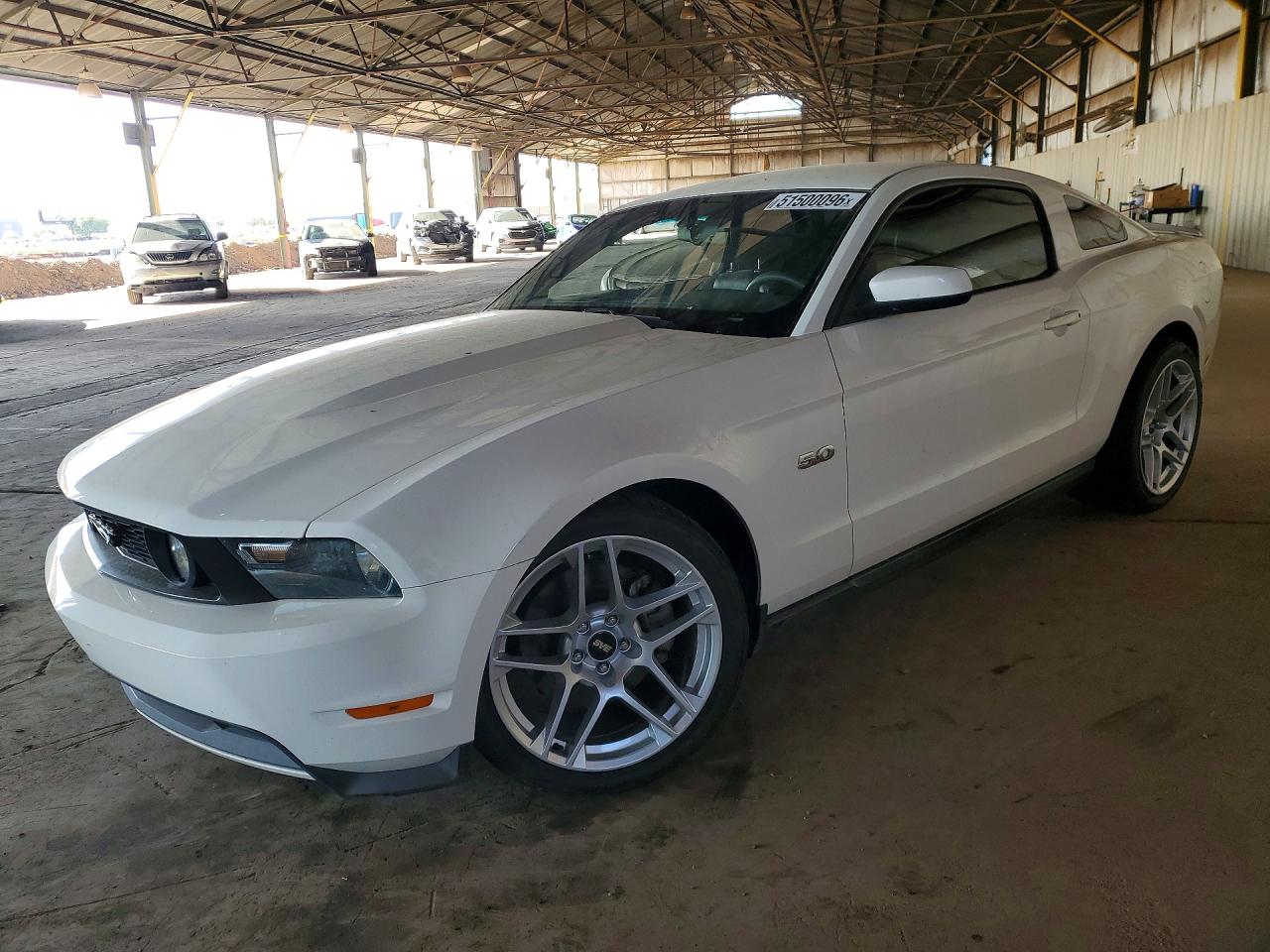 2012 Ford Mustang GT Premium, VIN 1ZVBP8CFXC5256850 — Side
