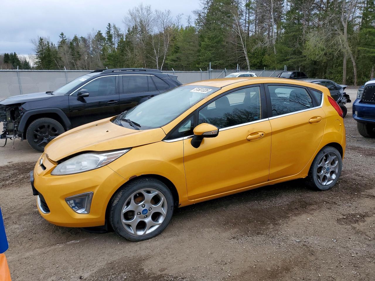 2011 Ford Fiesta SES, VIN 3FADP4FJXBM222507 — Mechanical