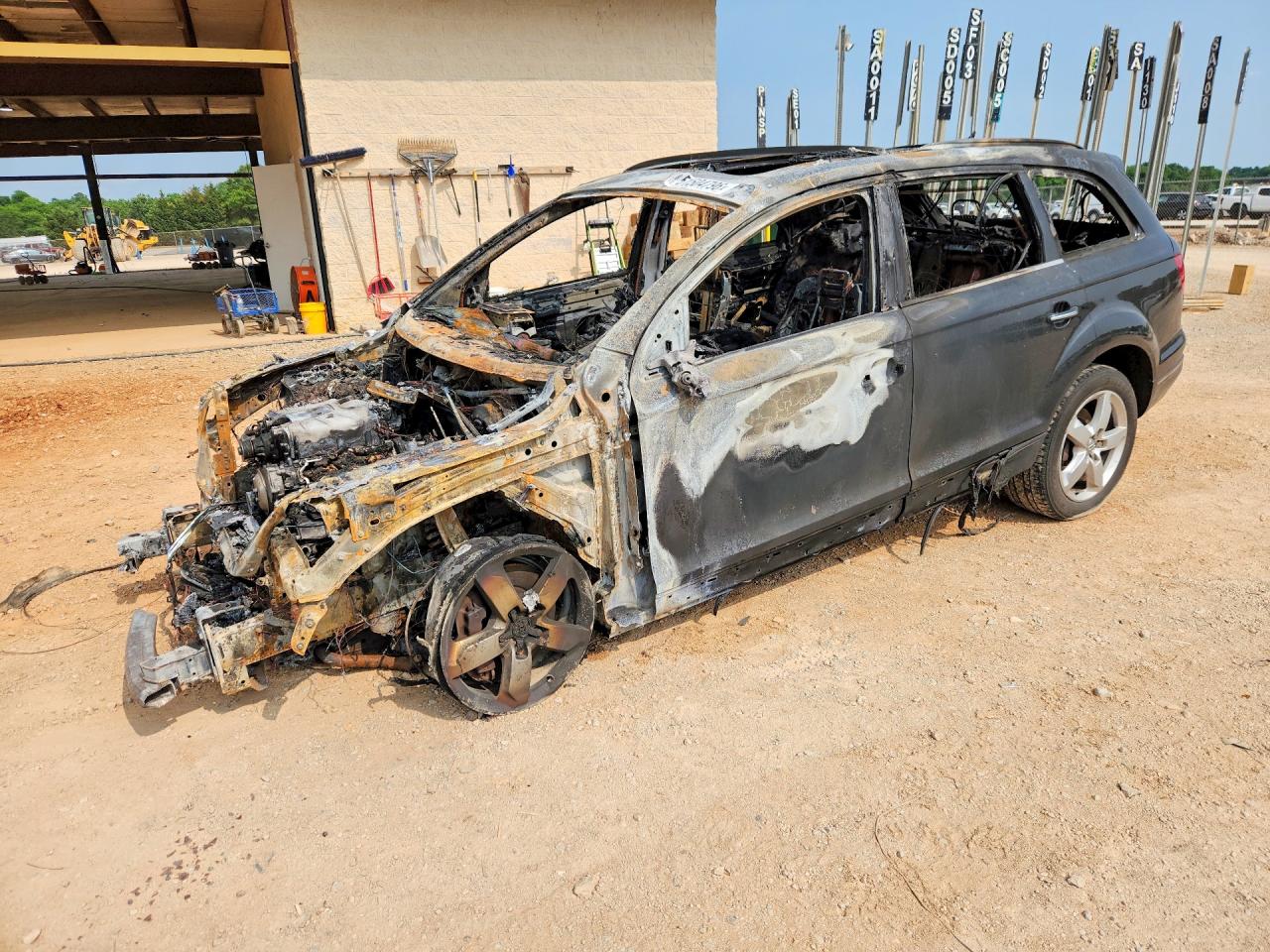 2015 Audi Q7 Premium, VIN WA1CGAFE9FD020597 — Burn