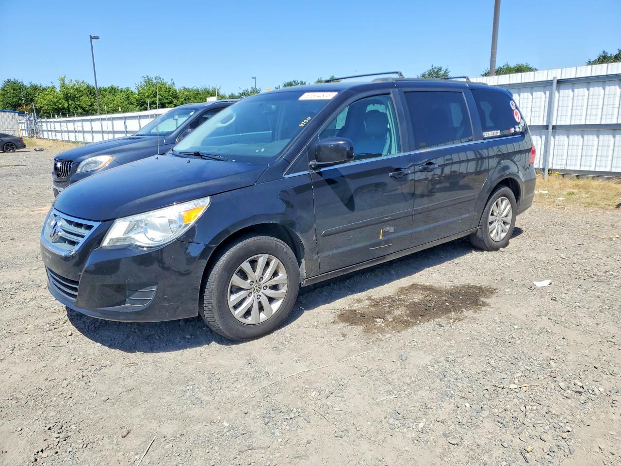 2013 Volkswagen Routan SE, VIN 2C4RVABG2DR724728 — Water / flood