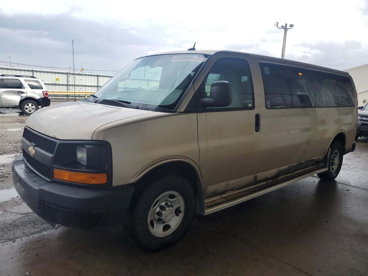 2012 Chevrolet Express Passenger 1LS, VIN 1GAZGZFA1C1125149 — Minor dents and scratches