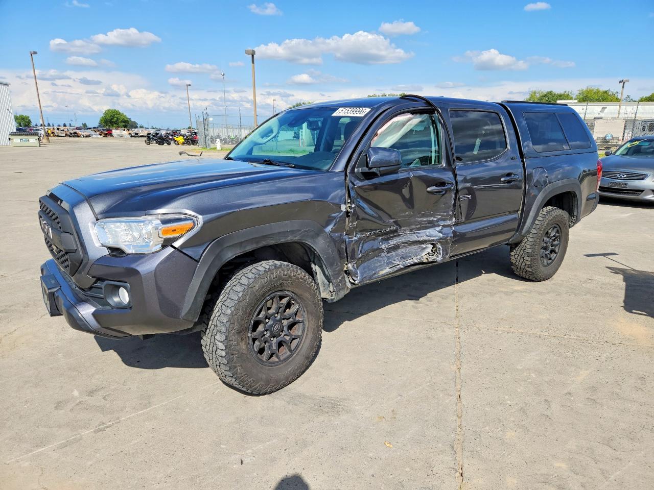 2019 Toyota Tacoma TRD Off Road, VIN 3TMCZ5AN8KM240424 — Side
