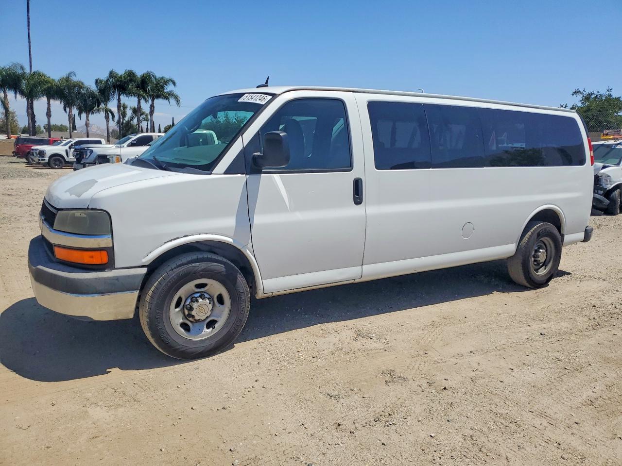 2013 Chevrolet Express Passenger 1LS, VIN 1GAZGZFG2D1151135 — Rear end