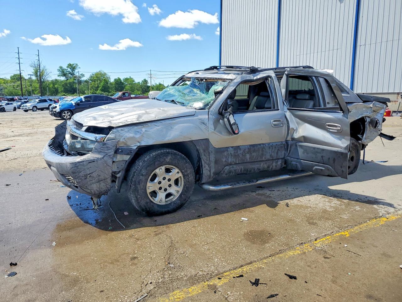 2005 Chevrolet Avalanche Z71, VIN 3GNEK12Z65G183609 — Rollover