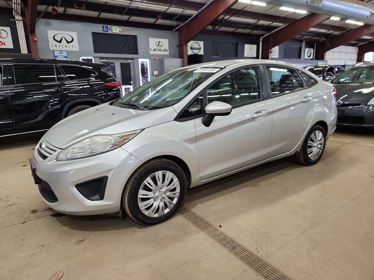 2013 Ford Fiesta S, VIN 3FADP4AJ7DM148943 — Minor dents and scratches
