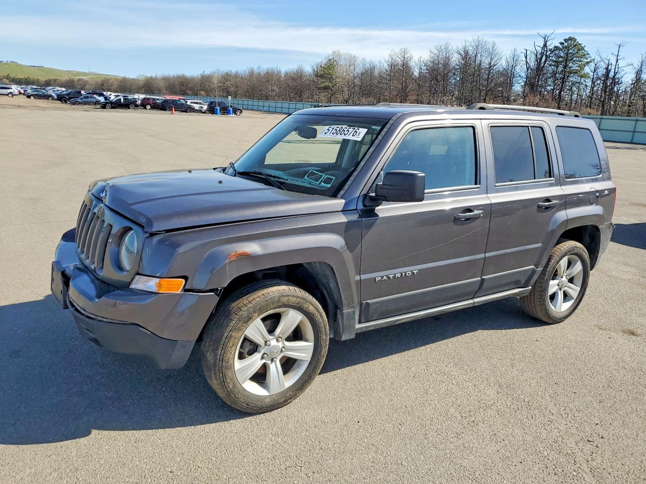2017 Jeep Patriot Latitude, VIN 1C4NJRFB3HD129077 — Side