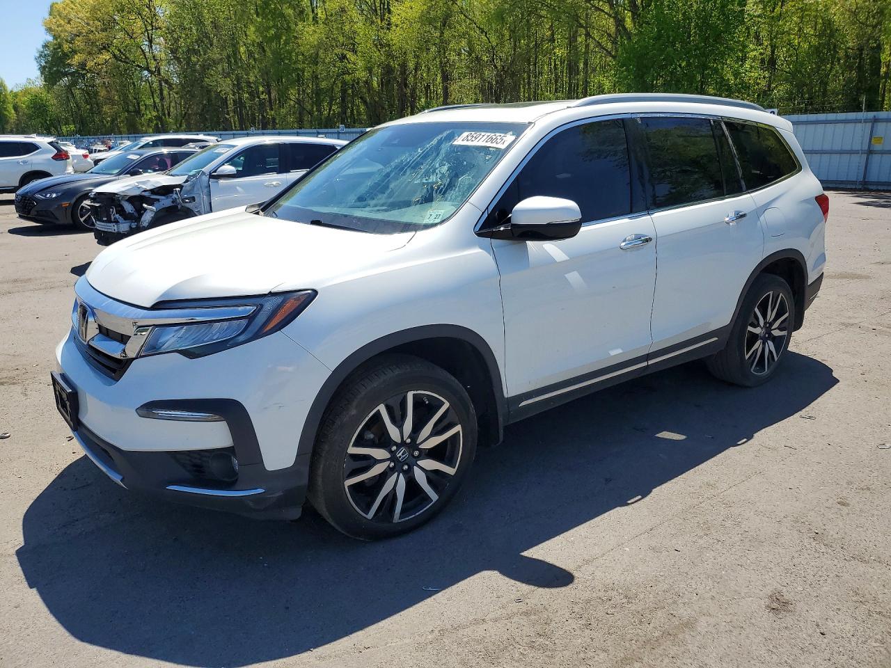 2022 Honda Pilot Touring 7-Passenger, VIN 5FNYF6H60NB060737 — Water / flood