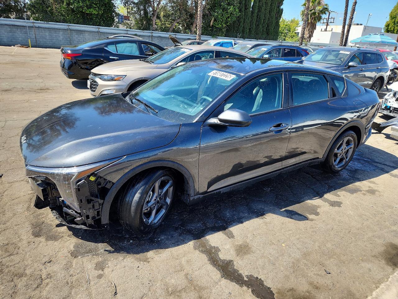 2025 Kia K4 LXS, VIN 3KPFT4DE5SE065757 — Undercarriage