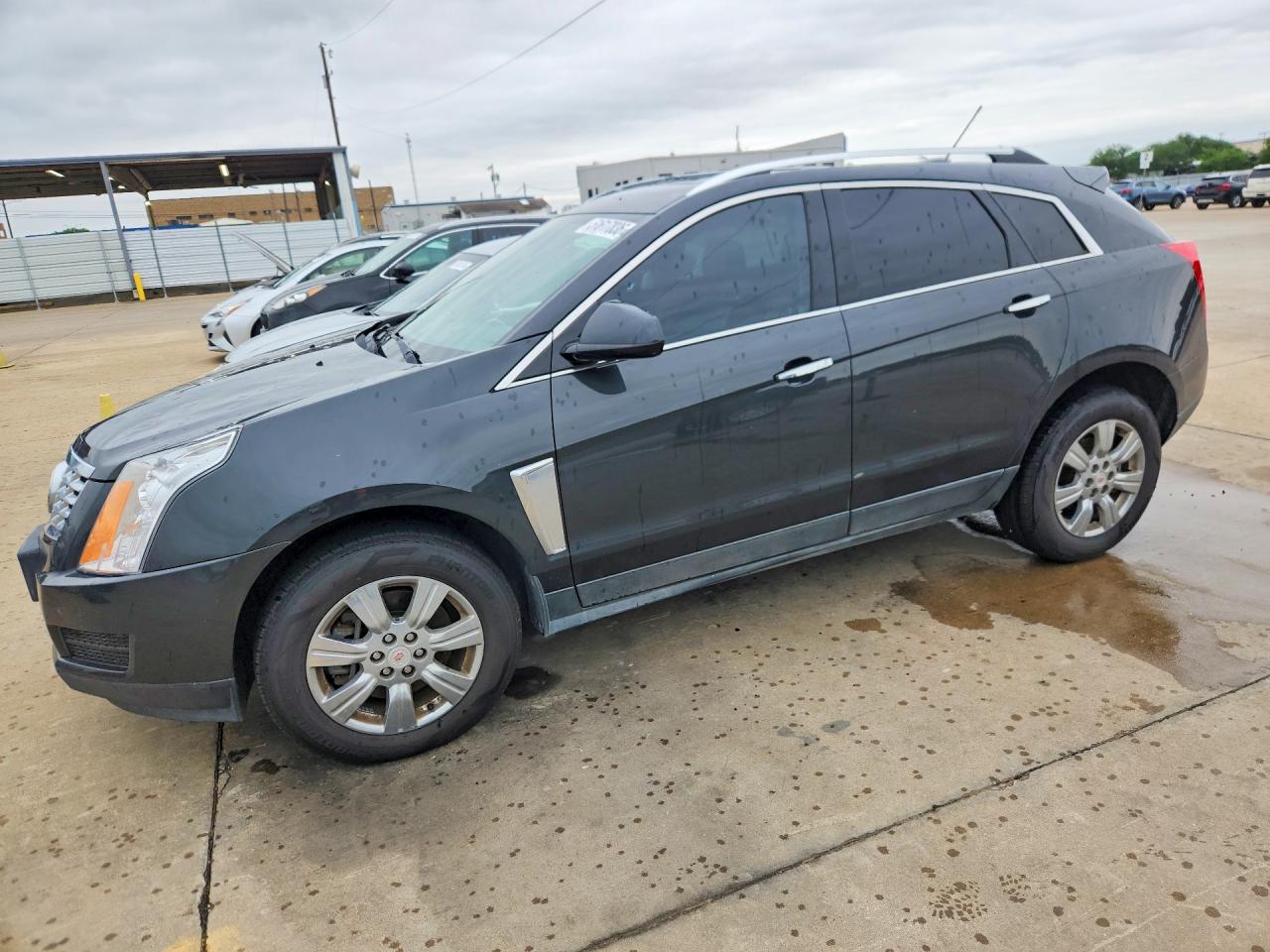 2016 Cadillac SRX Luxury Collection, VIN 3GYFNBE37GS547354 — Hail
