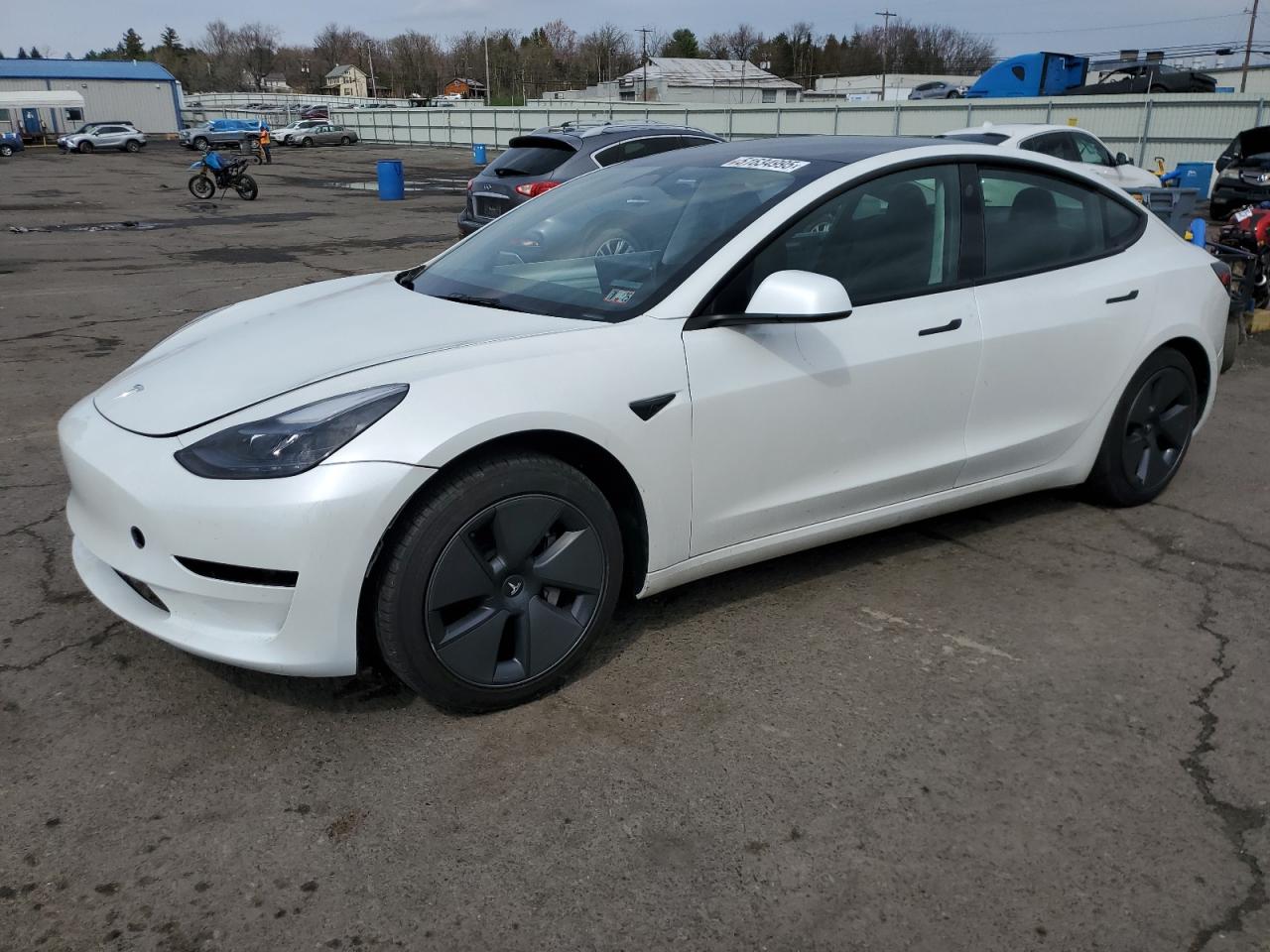 2023 Tesla Model 3, VIN 5YJ3E1EA3PF563318 — Side