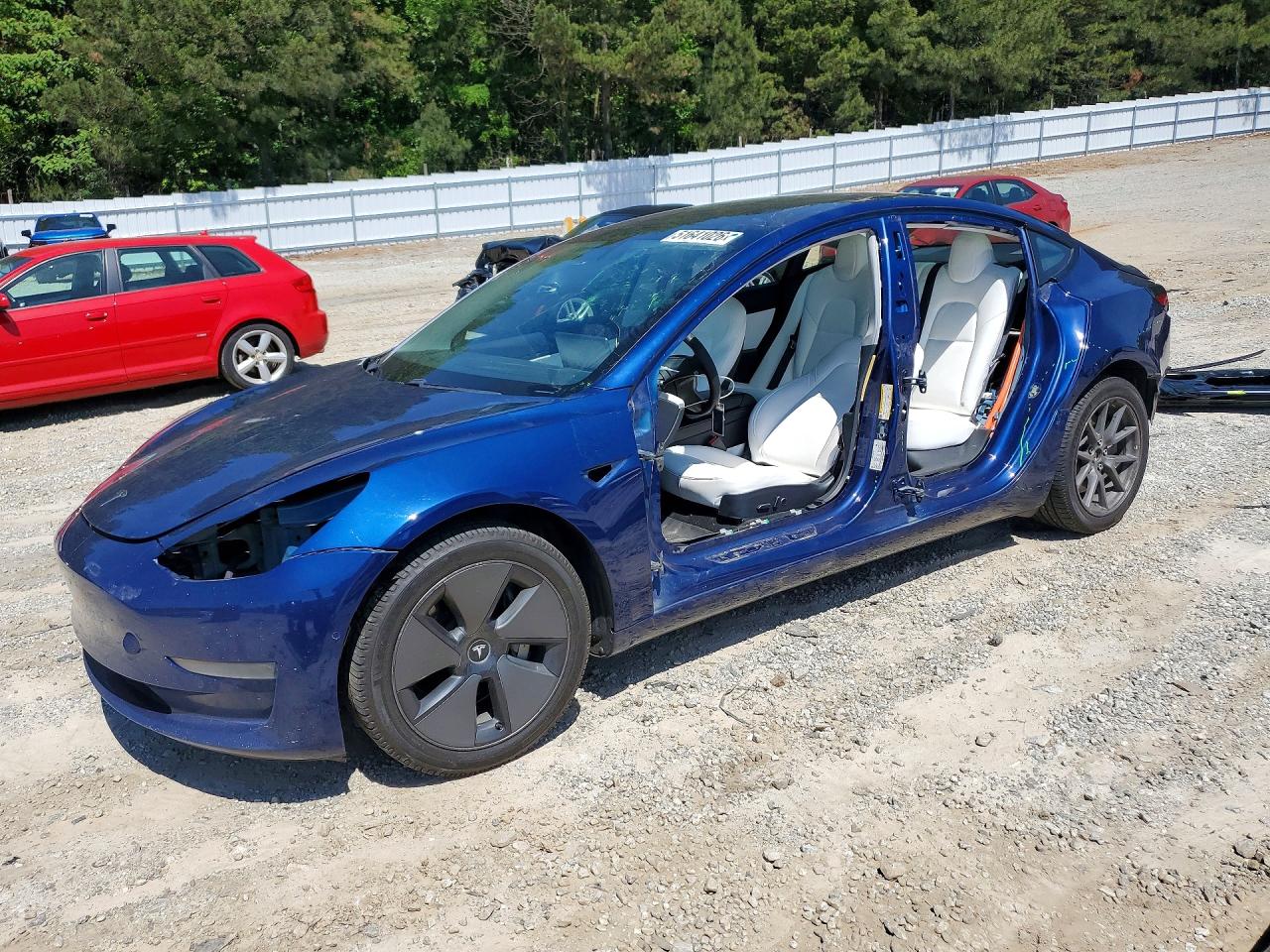 2021 Tesla Model 3 Standard Range Plus, VIN 5YJ3E1EA7MF920625 — Rollover
