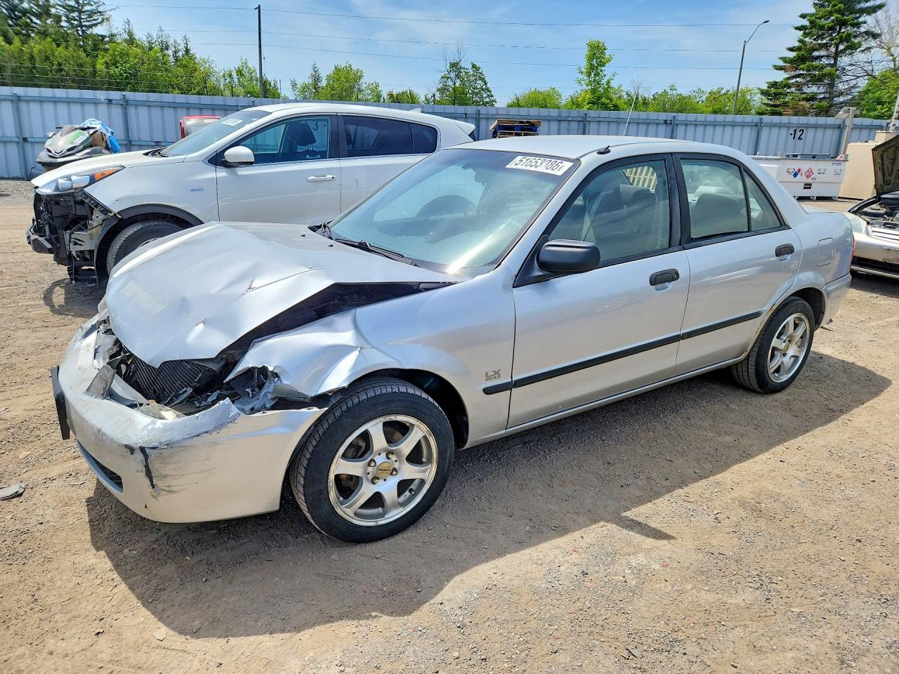 2001 Mazda Protege LX, VIN JM1BJ225310432108 — Front end