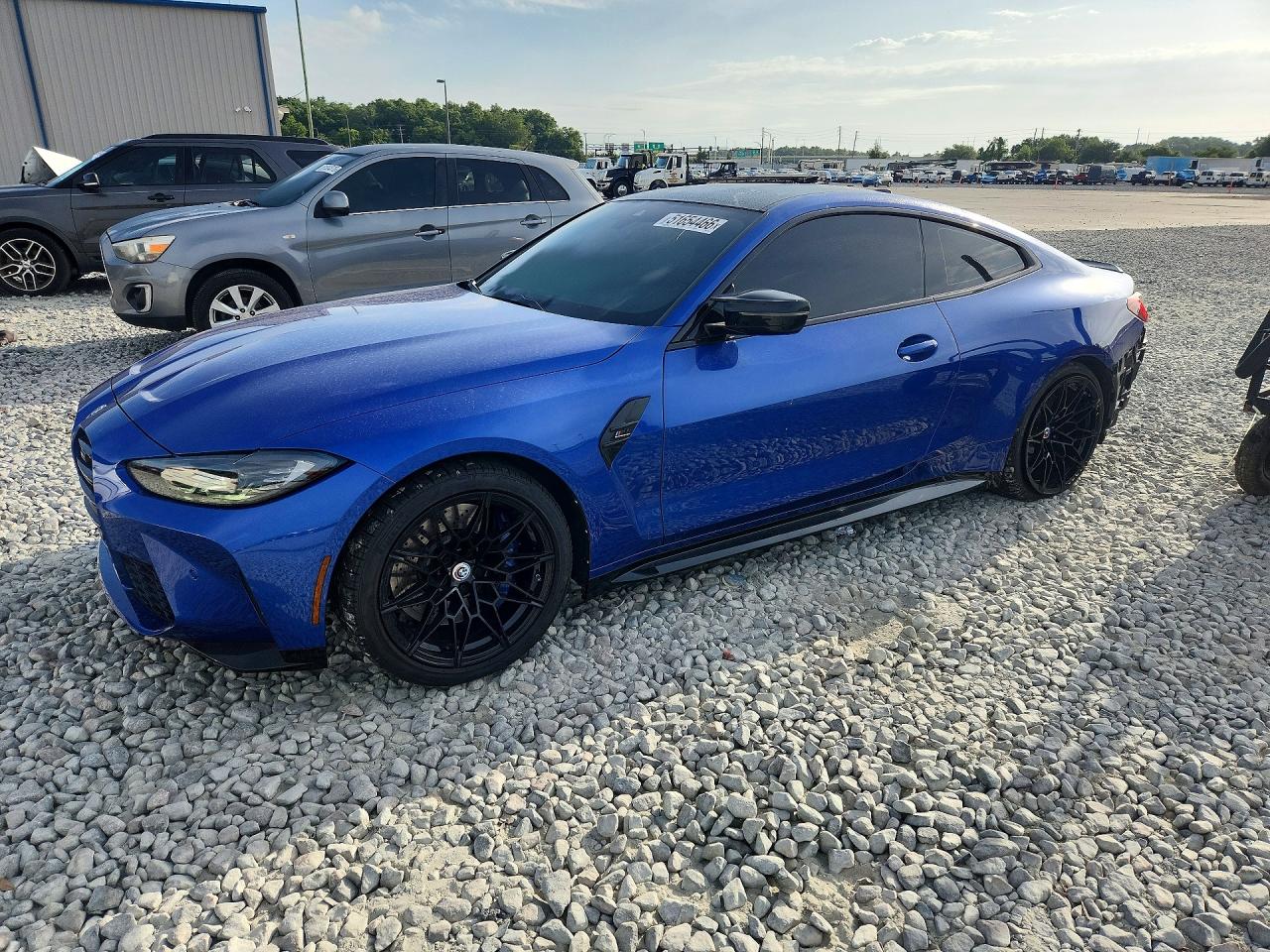 2023 BMW M4 Competition xDrive, VIN WBS43AZ03PCM23318 — Rear end