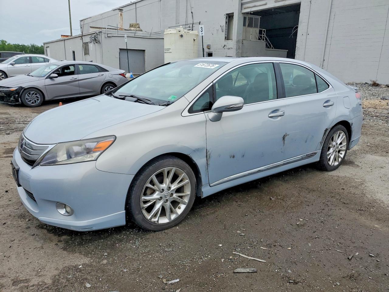 2010 Lexus HS 250h Premium, VIN JTHBB1BA3A2001677 — Side