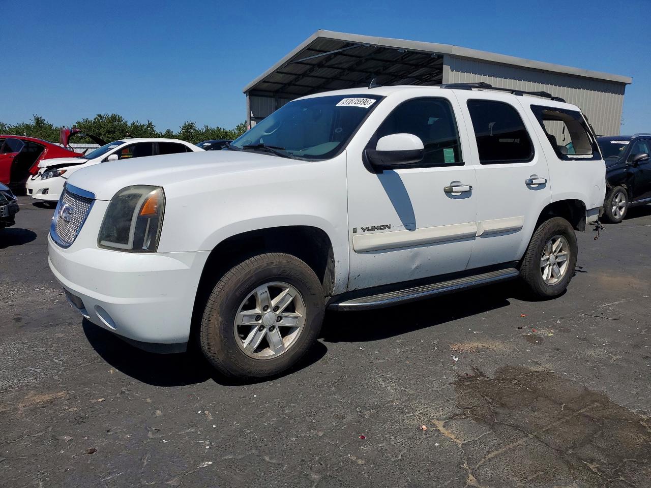 2009 GMC Yukon SLE 3SA, VIN 1GKFC23J29R214096 — Rear end