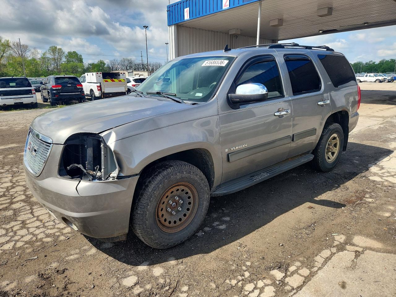 2009 GMC Yukon SLT 4SB, VIN 1GKFK33069R244489 — Front end