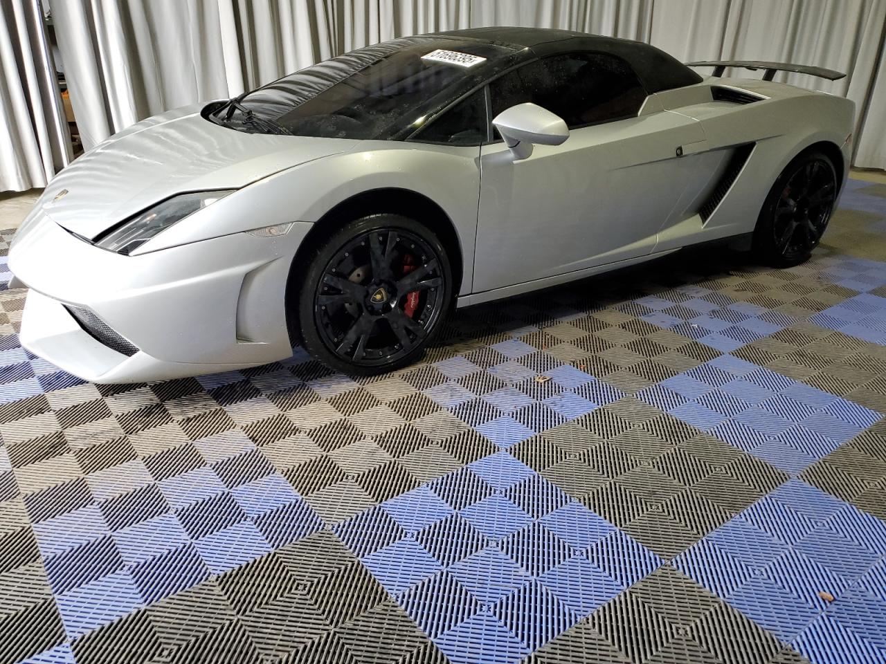 2013 Lamborghini Gallardo, VIN ZHWGU6BZ7DLA12811 — Vandalism